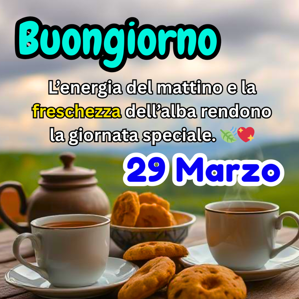 Due tazze di caffè fumante con biscotti su un tavolo all'aperto, con una vista panoramica e cielo nuvoloso. Testo motivazionale "Buongiorno" e "29 Marzo" con un messaggio positivo sulla freschezza del mattino.